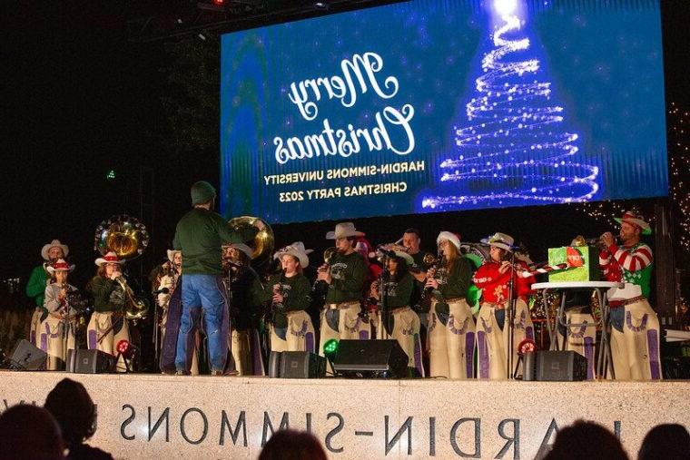 The band plays during the annual Christmas party on campus.